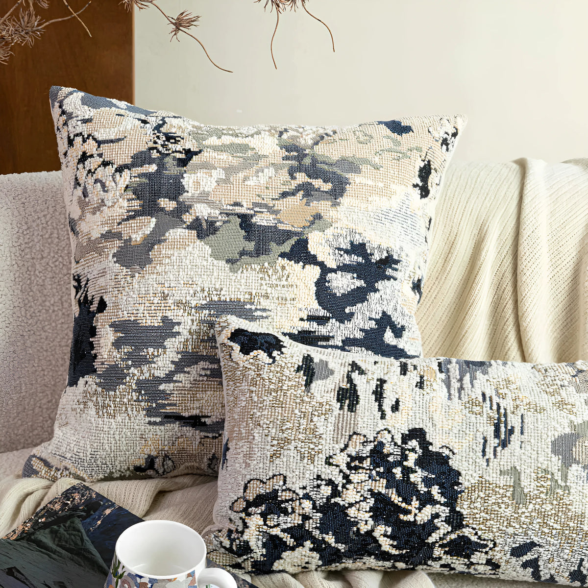 Blue flower and plant pattern decorative cushion in Chinese style, shown as square and lumbar pillow.