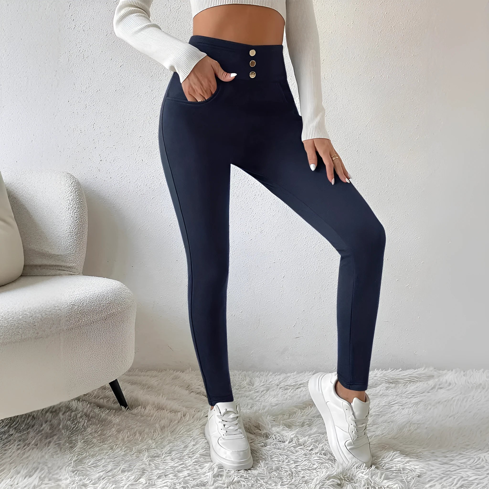 Navy blue women's high-waist straight-leg trousers laid flat, showing the front design.