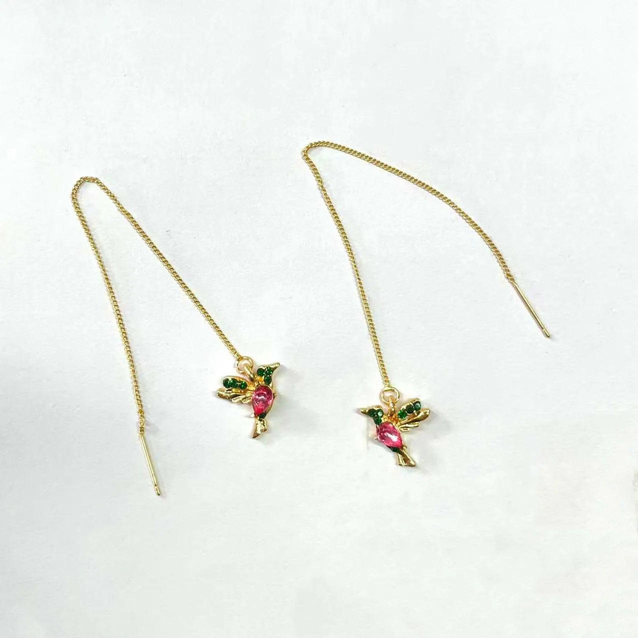 Women's long style bird hanging dangle earrings with mixed zirconium wing details in alloy construction