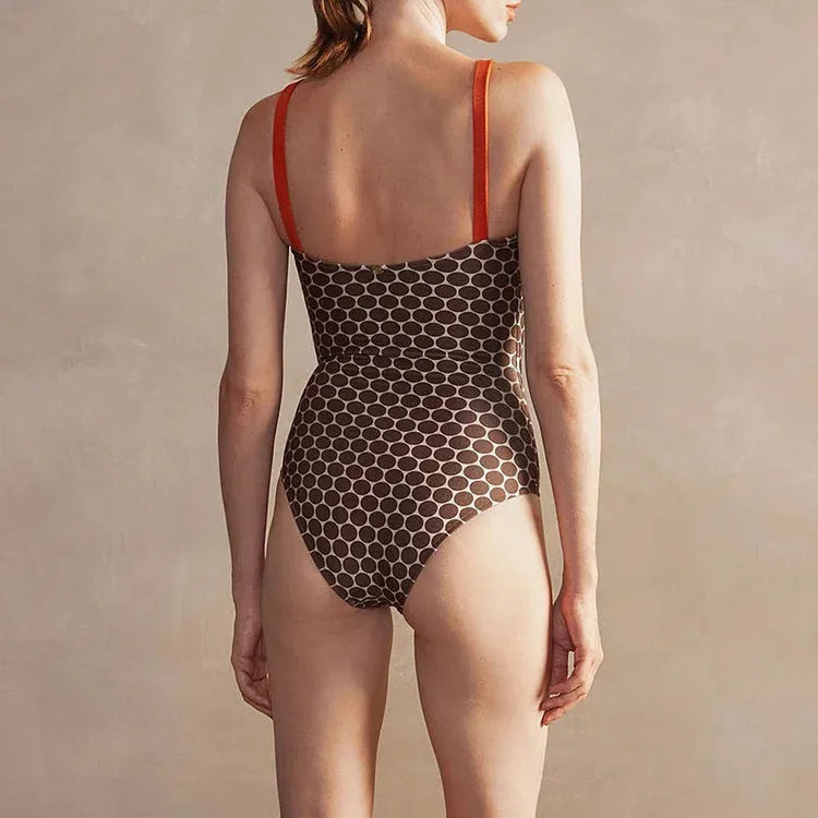 Women's printed dot pattern one-piece swimsuit with matching wrap skirt
