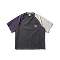 Dark grey men's loose fit t-shirt with contrasting colour raglan short sleeves.