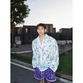 Pink and blue floral embossed long sleeve shirt with loose fit design for summer wear