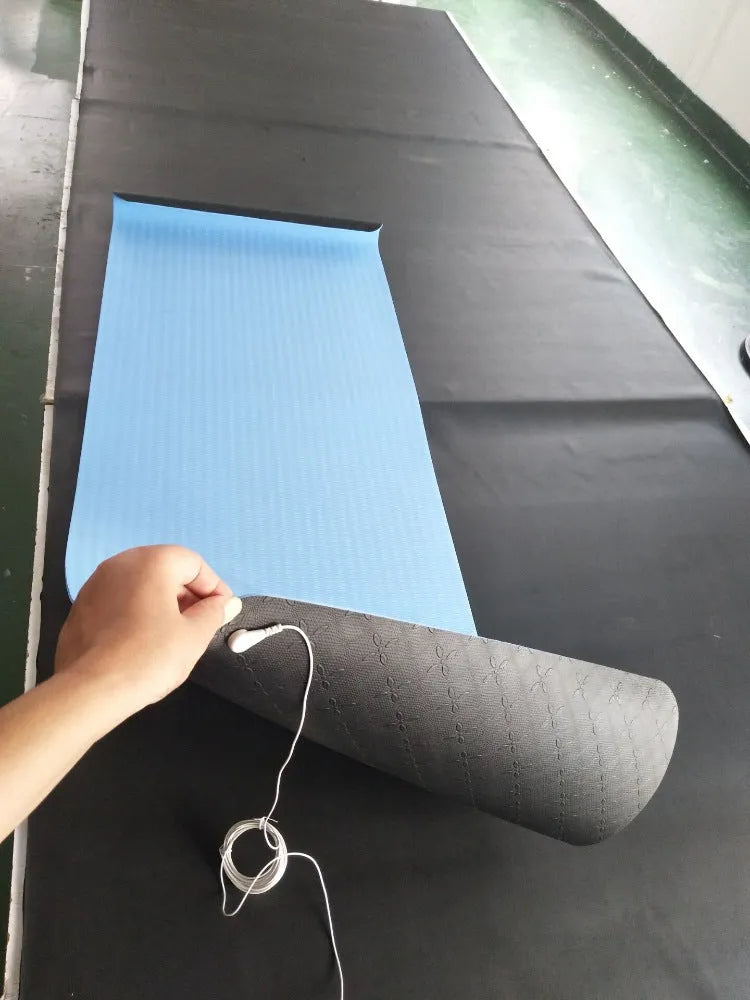 Blue floral pattern conductive yoga mat with grounding wire, showing non-slip PU surface