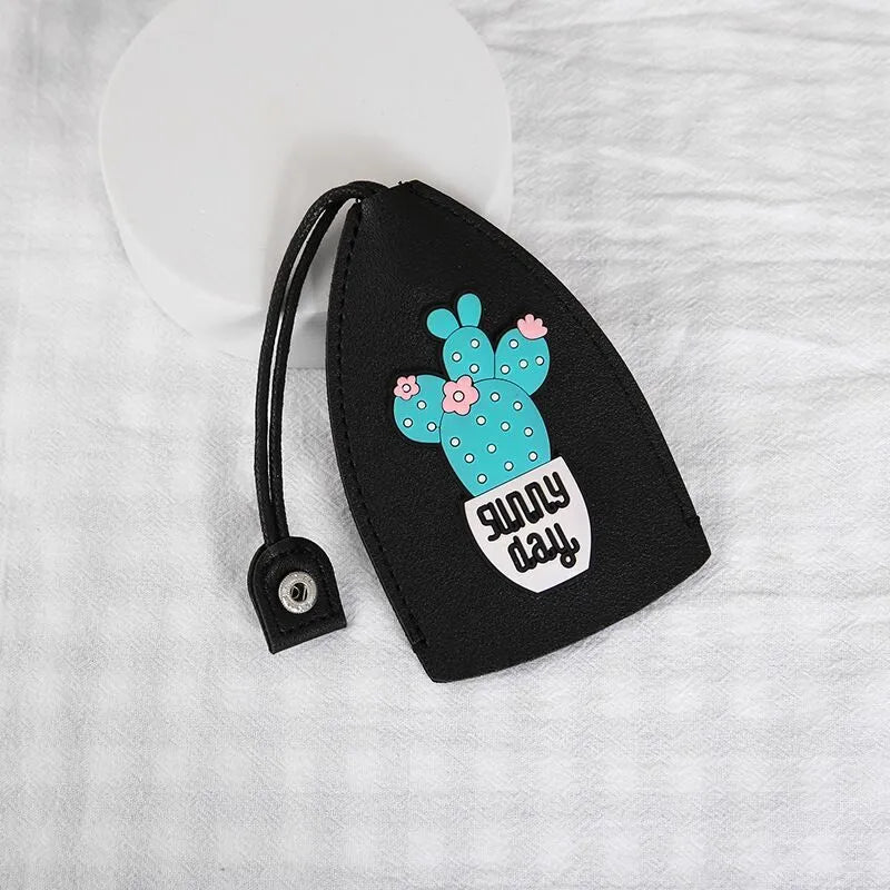 Cartoon pull-out car key case in PU leather with various design options including cactus, rabbit, and fruit themes