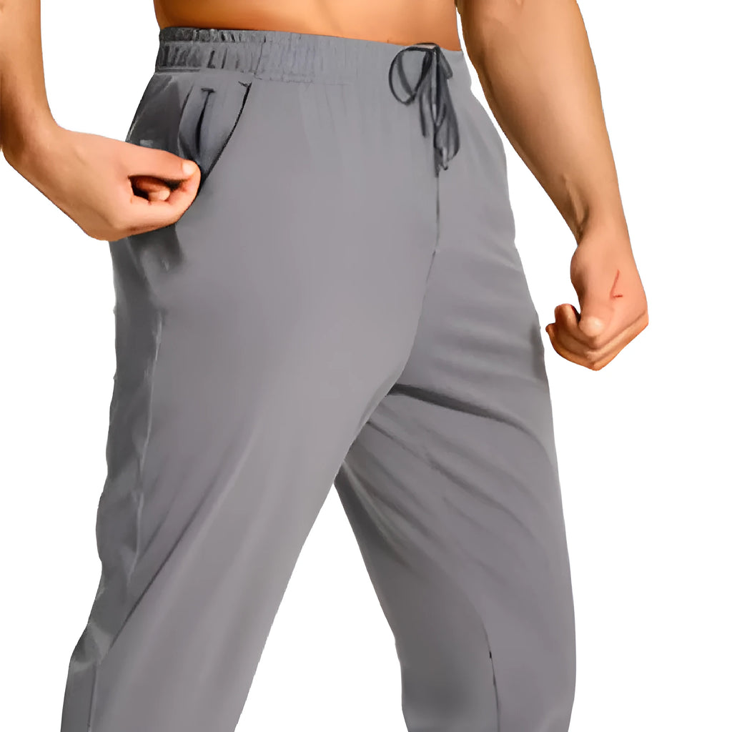 Men's loose fit polyester trousers in solid colour available in sizes XS to 4XL