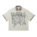Men's loose blue cotton top with graffiti print on lapel and asymmetrical streetwear design.