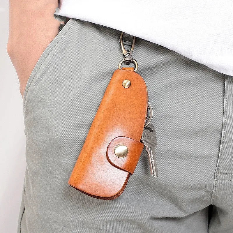Genuine leather handmade key case in black, brown, coffee, or purplish red.