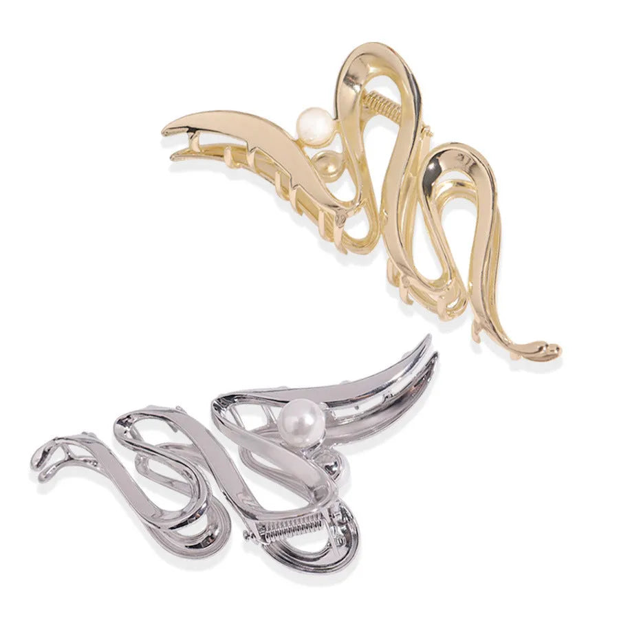 Assortment of silver metal hair barrettes and claw clips in various Korean-style designs on a white background.
