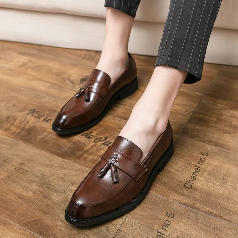 Men's black and brown tassel slip-on business casual shoes with a rubber sole