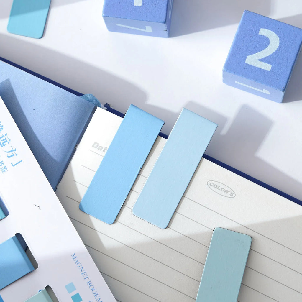 Set of four Morandi colour block magnetic bookmarks showing different muted tone designs.