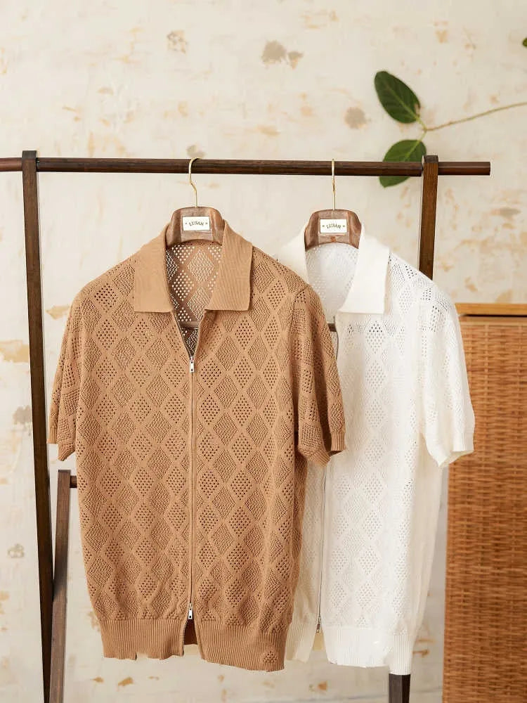 White cotton cardigan with zipper front and lapel collar showing short sleeve design