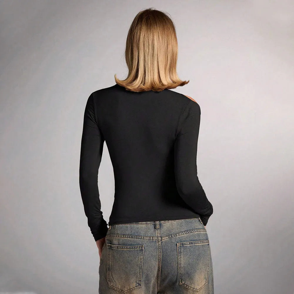 Black women's halter neck slim fit top with long sleeves on mannequin