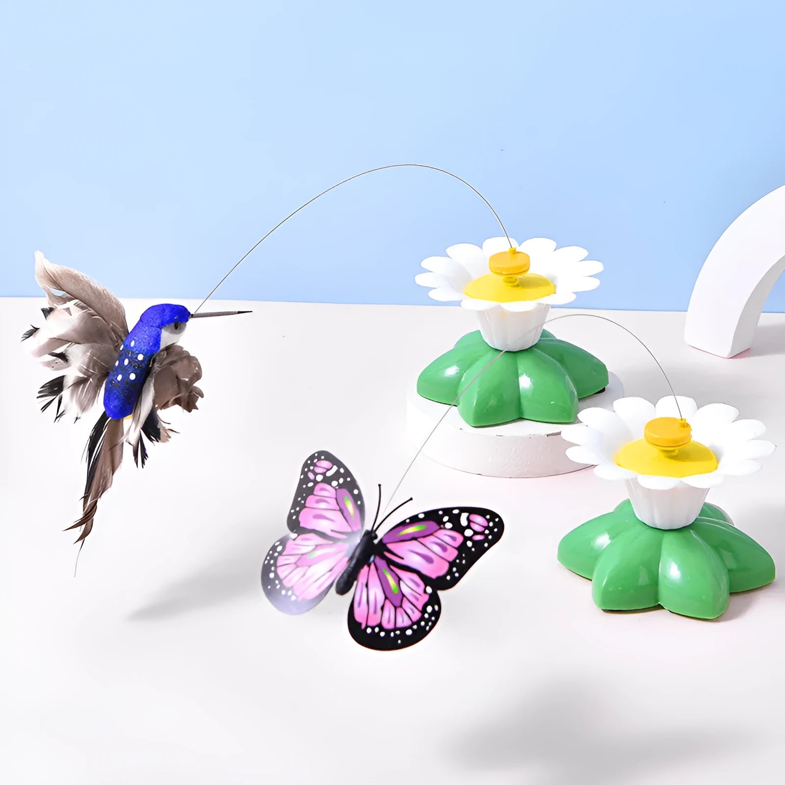 Automatic cat teaser electric rotation toy with bird and butterfly attachments, plastic construction