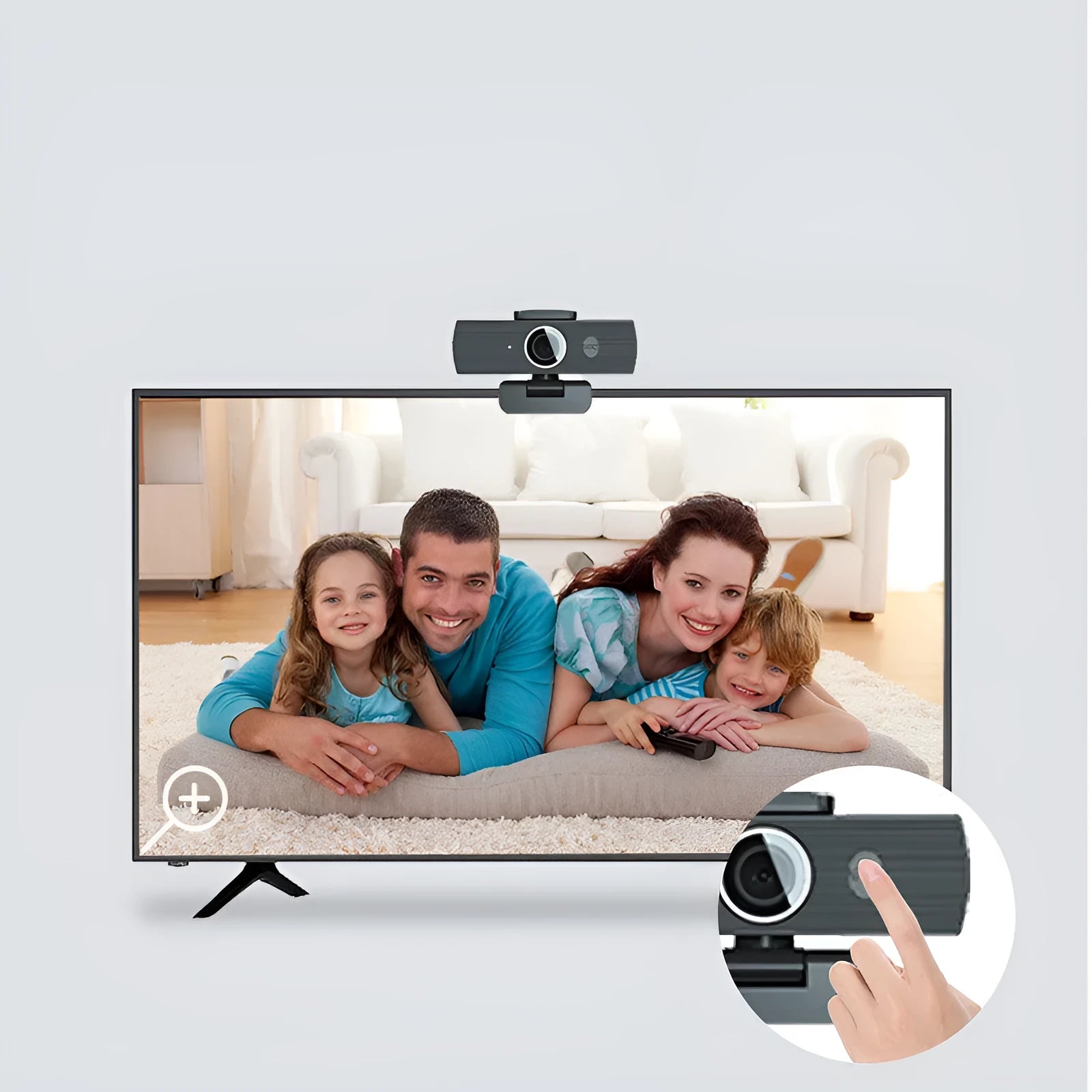 Black computer camera with magnetic privacy cover attached, showing USB cable connection