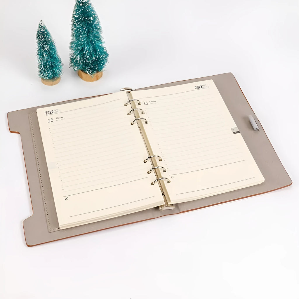 A5 white loose-leaf notebook inner pages with monthly plan layout on paper