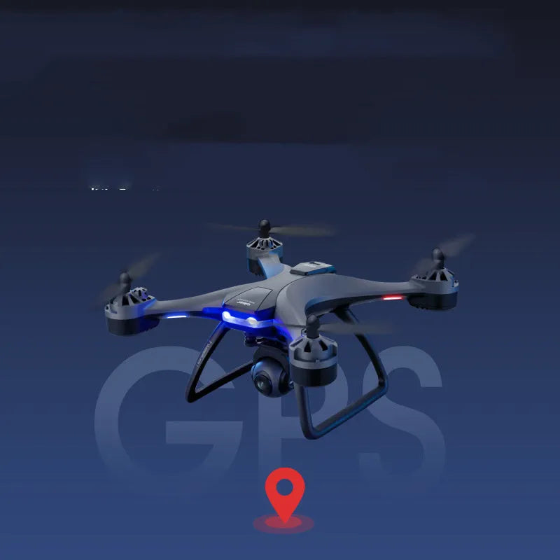 Plastic quadrocopter drone with GPS, remote controller, spare blades, and landing gear on grey background