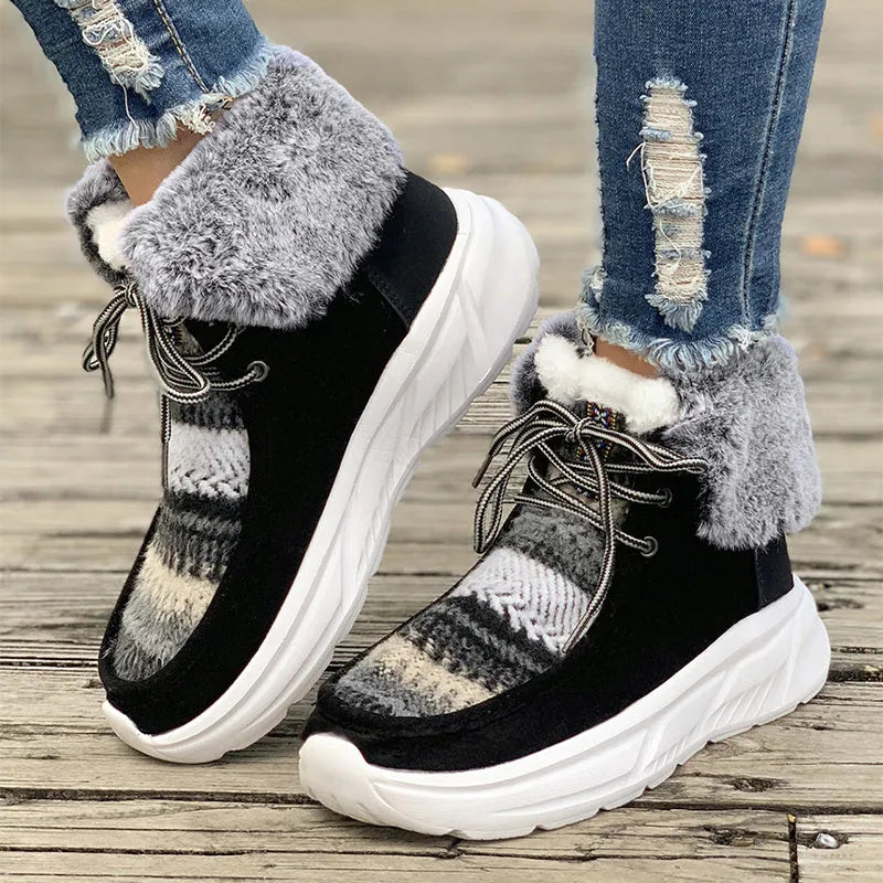 Women's beige lace-up snow boots with suede upper and thermal plush lining on a rubber sole.