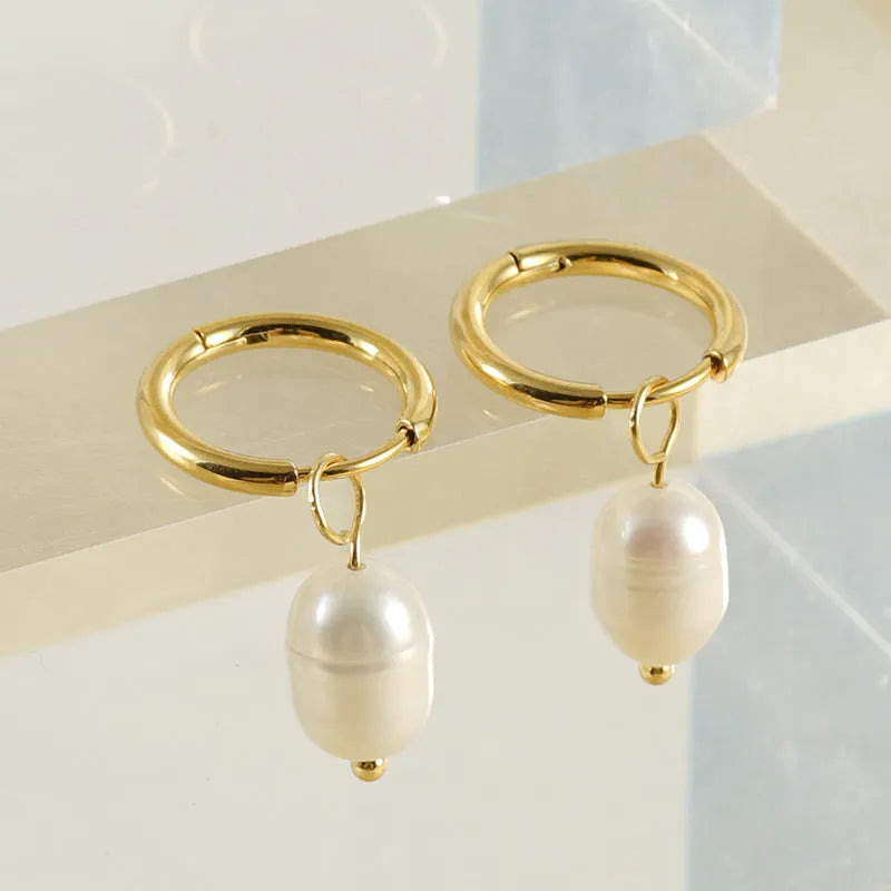 Gold geometric pearl earrings with stainless steel and titanium steel construction