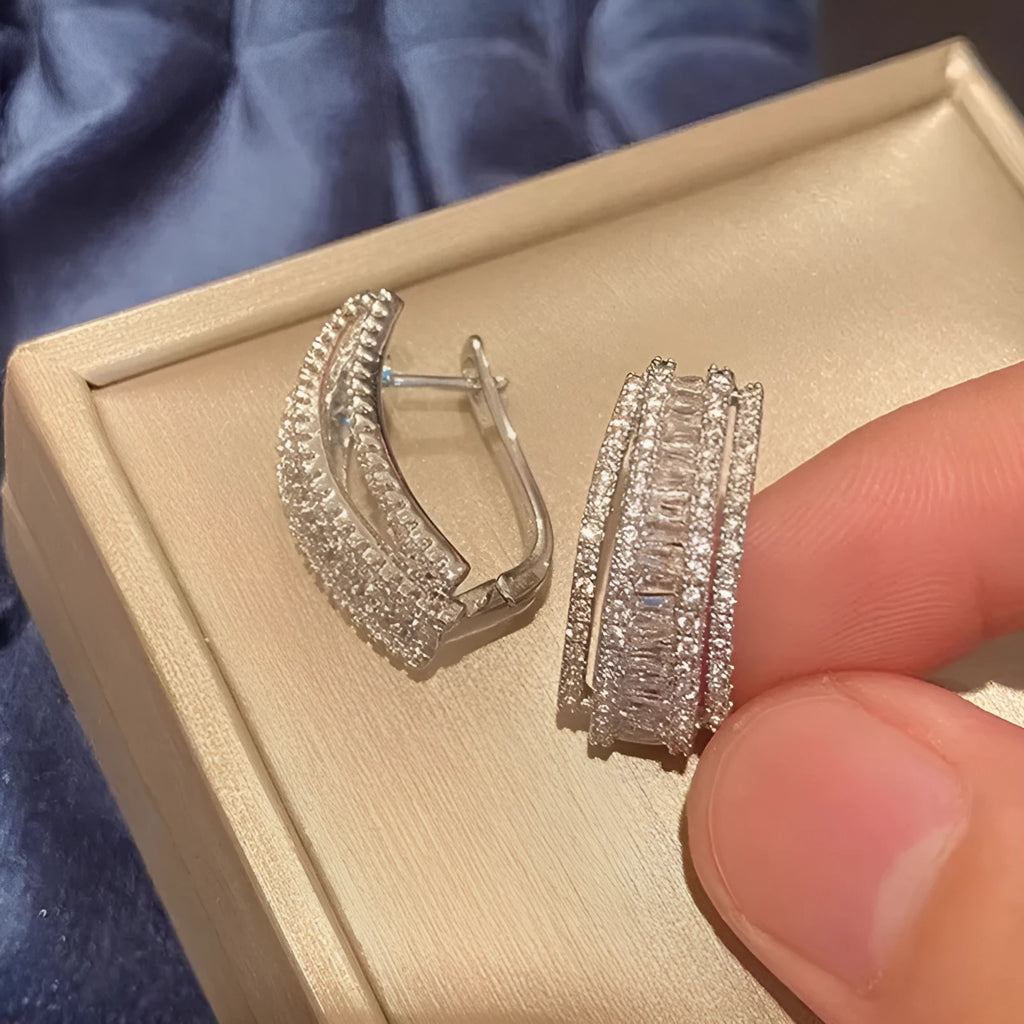 Geometric white gold colour zircon stud earrings with inlaid stone settings on copper