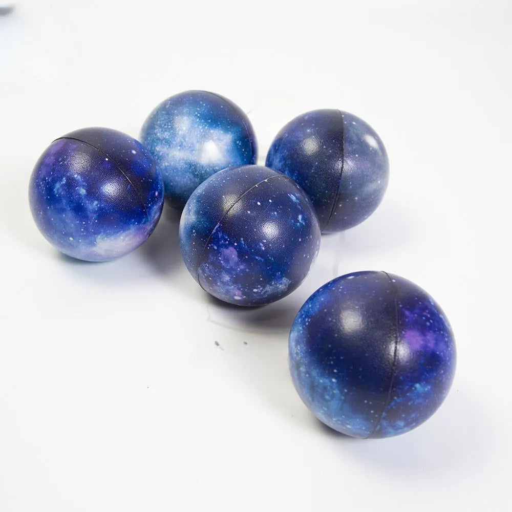 Set of eight solar system planet stress balls plus moon and sun in soft PU foam on white background