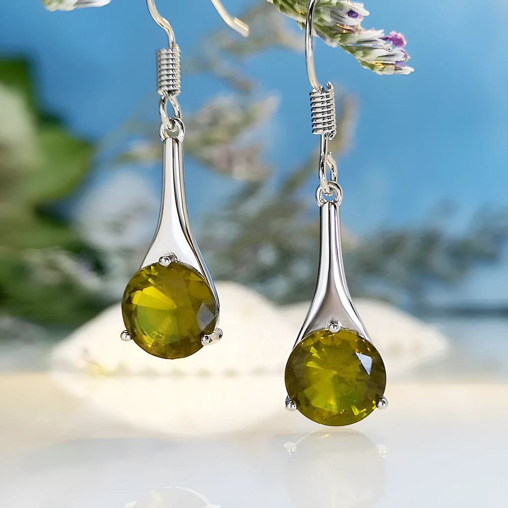 Olive green topaz drop earrings with minimalist water drop shape on alloy backing