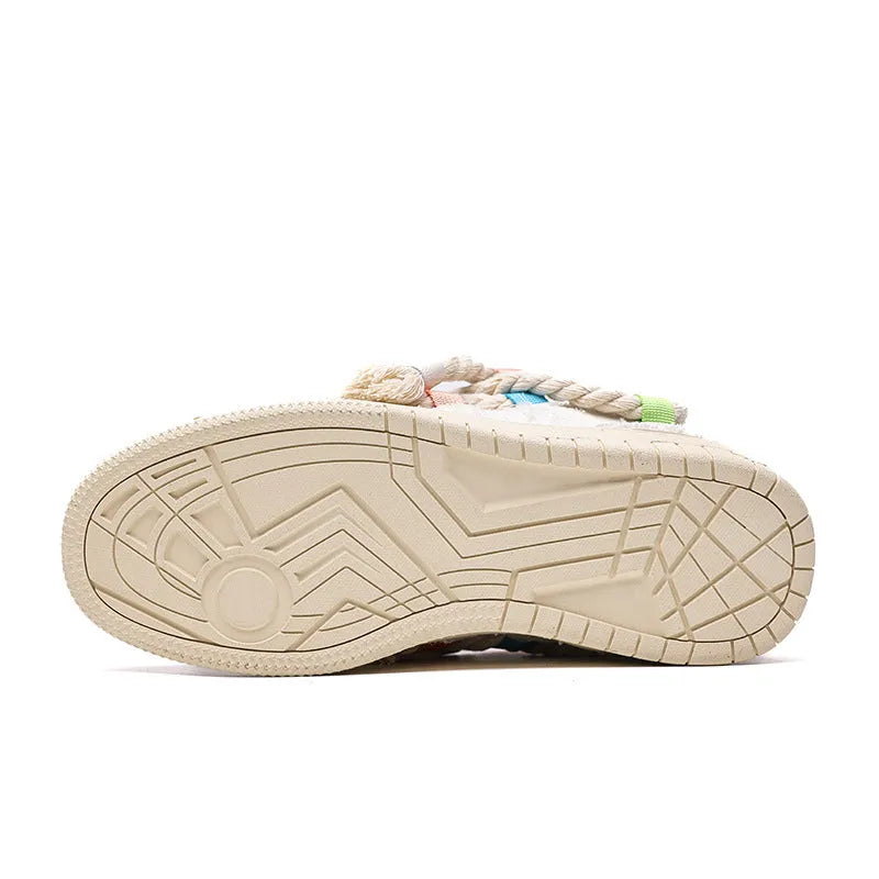 Creamy white retro skateboard shoes with lace-up front and platform rubber sole.