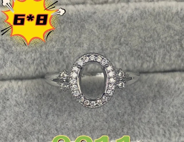 Oval denier ring with 6*8 stone, open mouth setting and star detail in Korean style