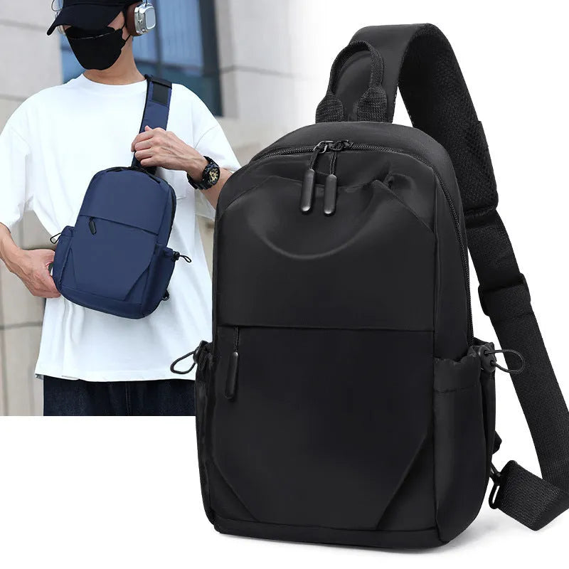 Mens grey waterproof chest bag showing front compartment and shoulder strap
