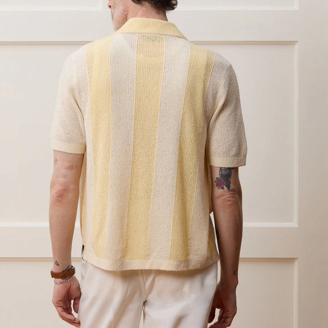 Bright yellow hollow-out short-sleeved polo shirt with asymmetrical design on Tencel fabric