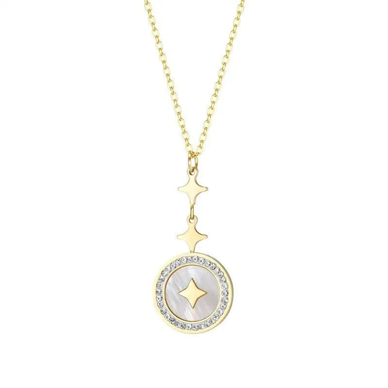 Gold titanium steel women's necklace with hexagonal star pendant on O-ring chain.