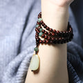 Carved rosewood bead bracelet with 6mm beads and Hotian jade pendant, unisex style