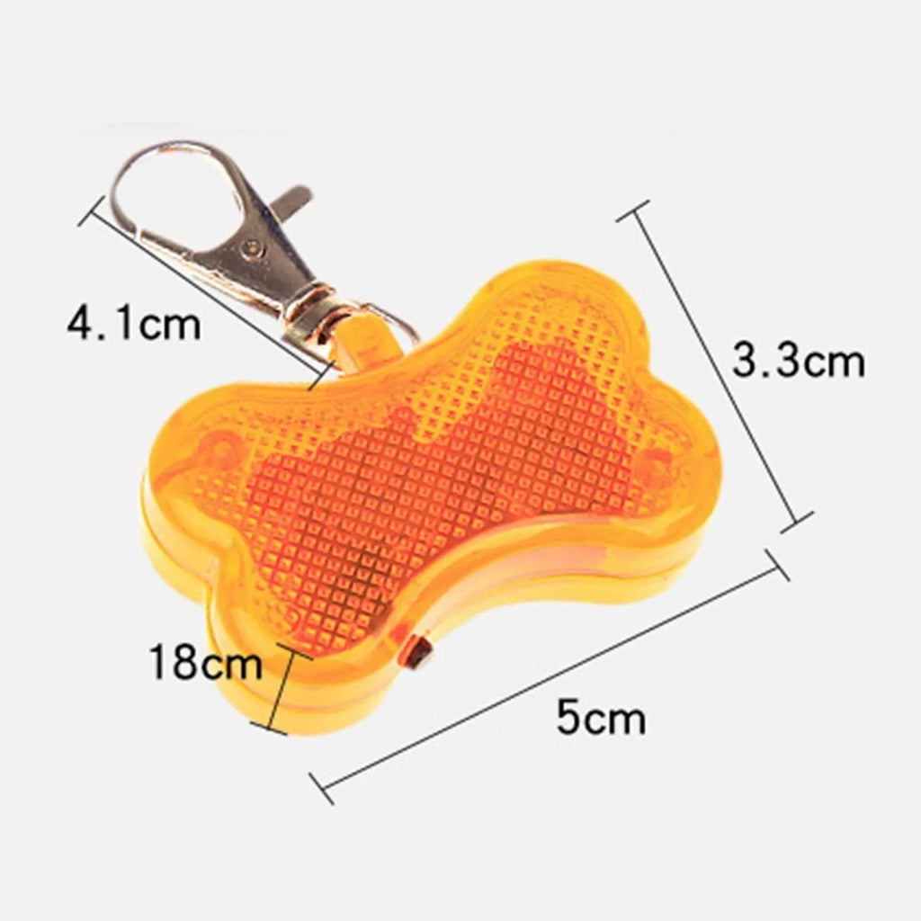 Bone-shaped LED pendant for pet collars in blue, green, orange, red, white, and yellow colours