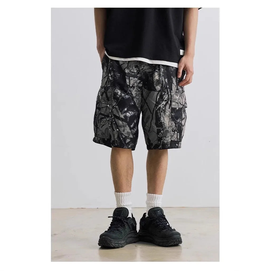 Loose casual straight-leg denim shorts in army green with zip placket closure