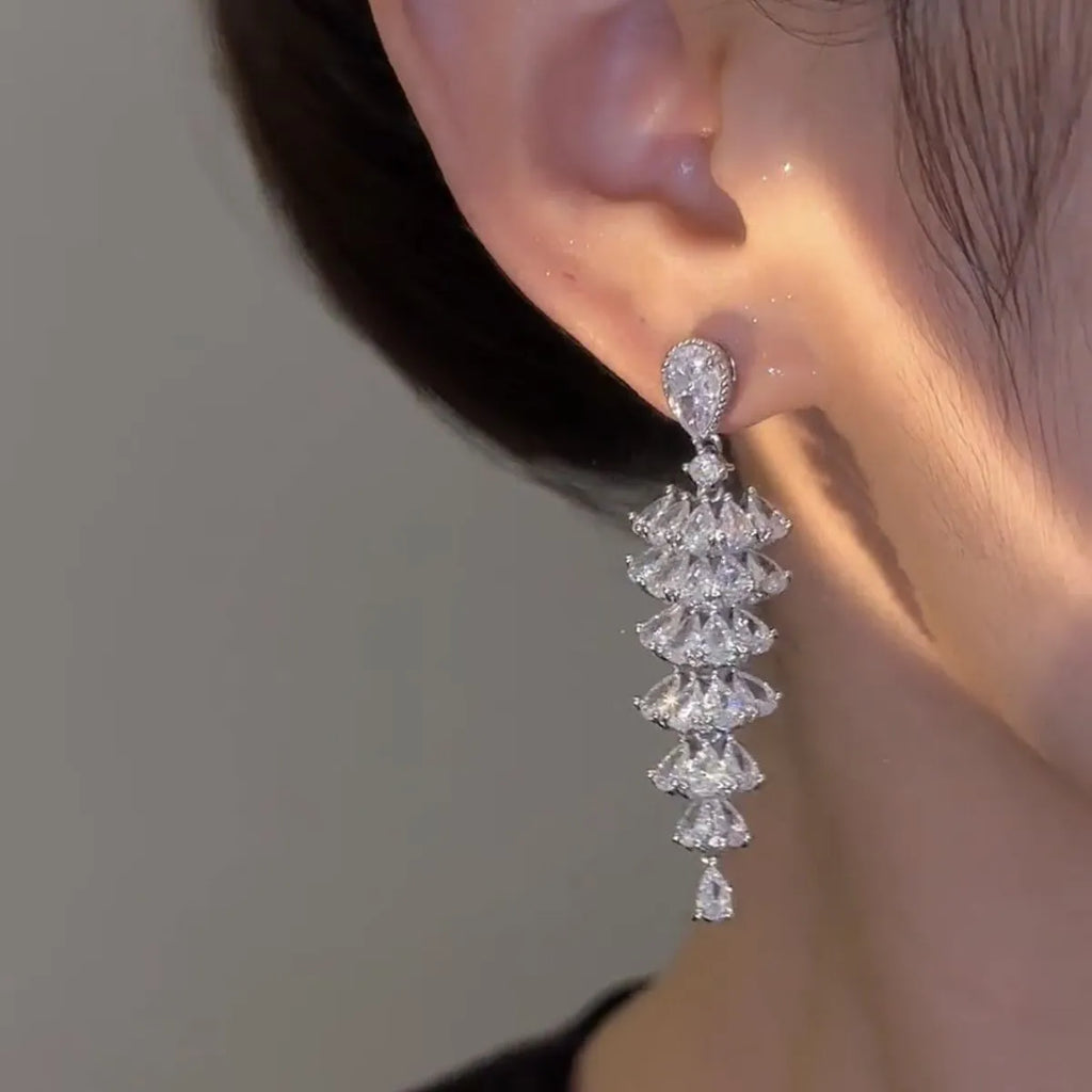 Zircon Christmas tree drop earrings with silver pagoda colour finish on copper construction