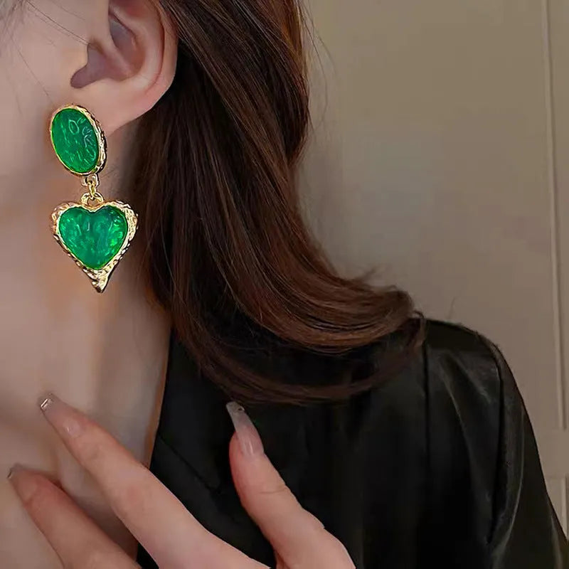 Silver needle pleated oval love heart stud earrings in purple, red, green, and yellow and white colours.