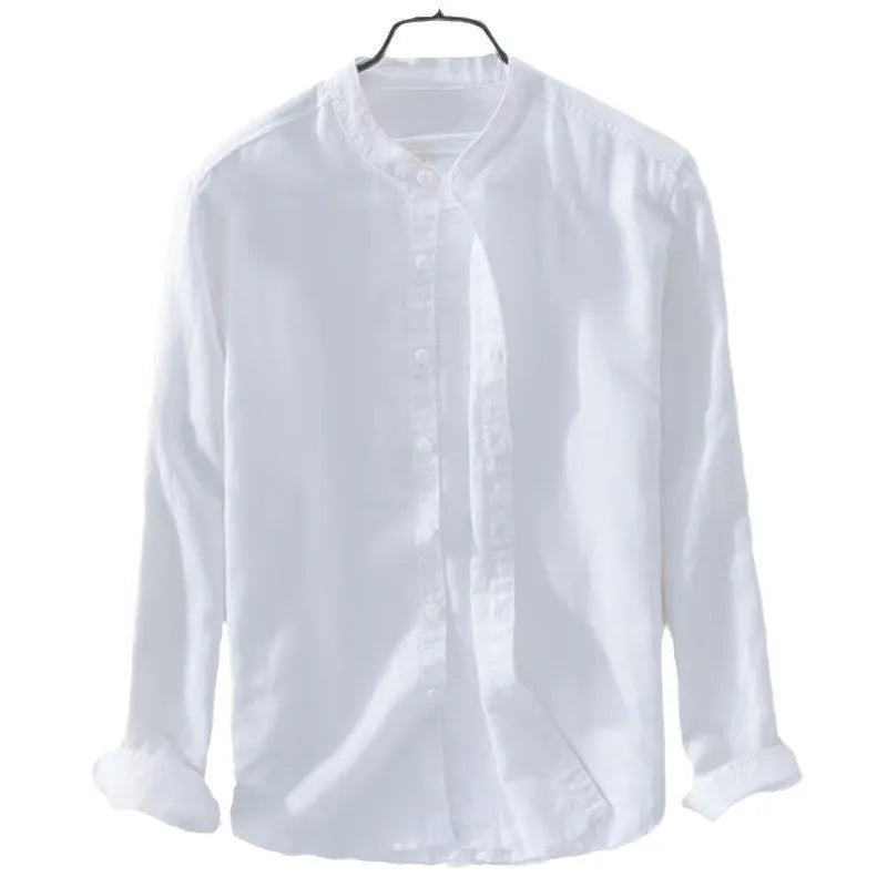 Man wearing a loose-fit light blue casual long sleeve shirt made from cotton linen fabric.