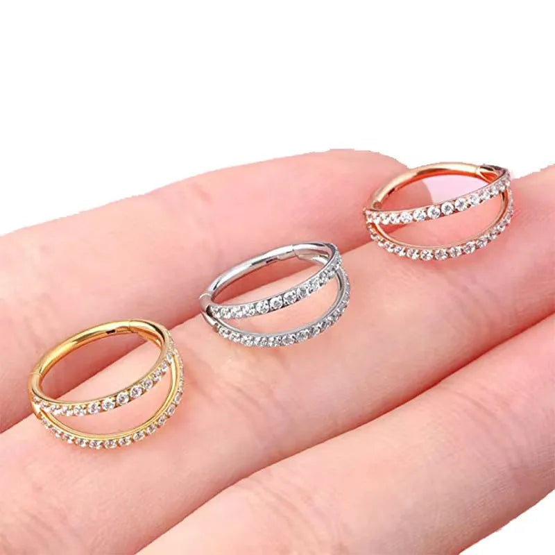 Titanium alloy nose ring with monoclinic diamond finish in gold and steel colour options showing precise measurements