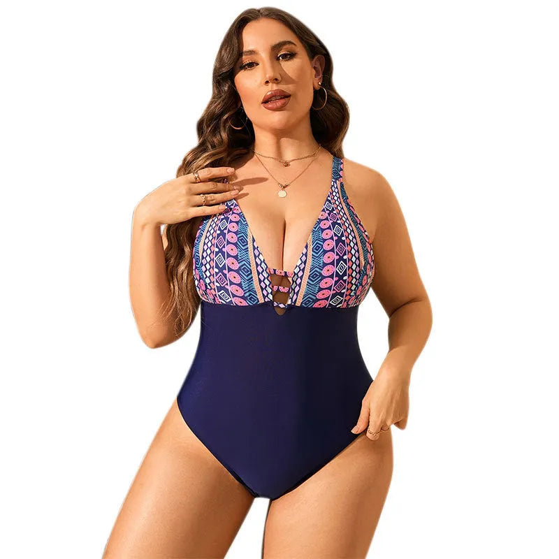 Leopard print plus size one-piece swimsuit with V-neck design on a mannequin.