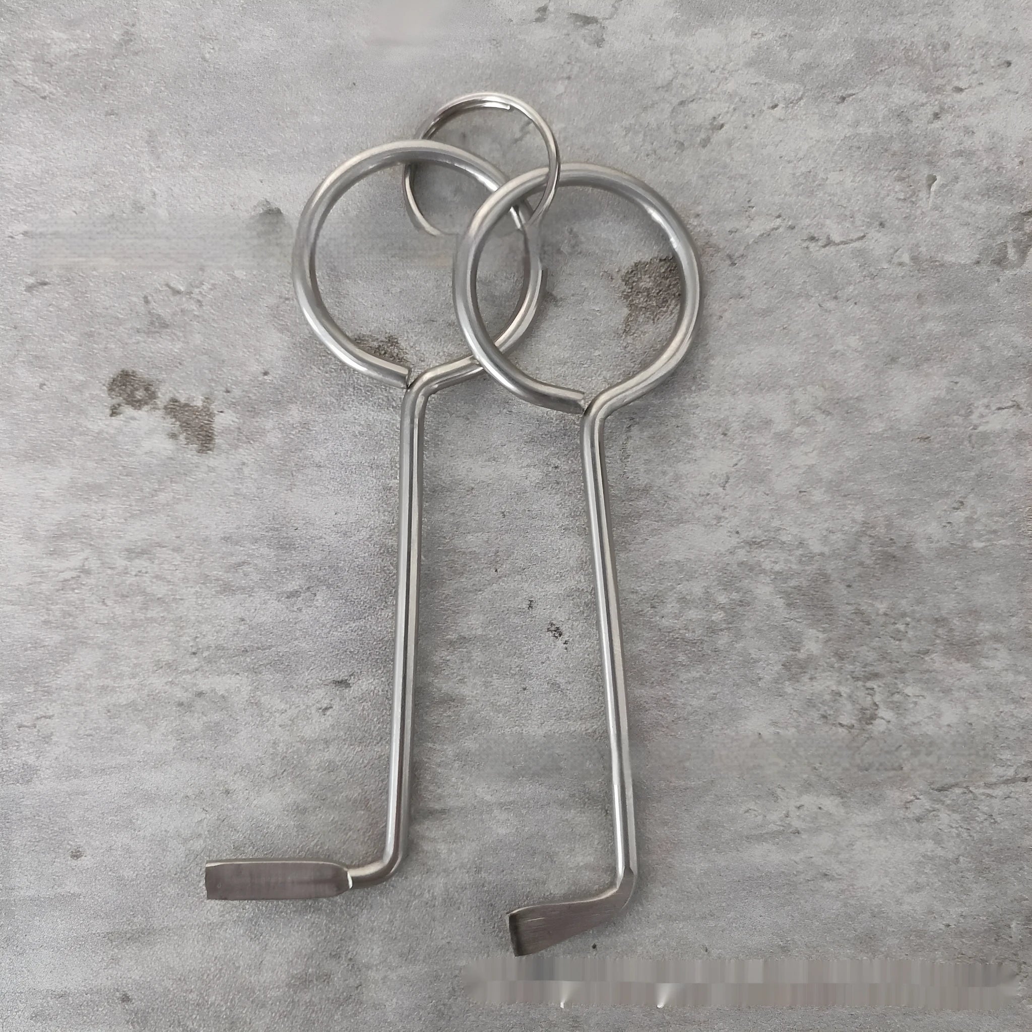 Two alloy steel wrench tools from a portable 2-piece universal tool set.