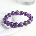 Natural Snow Mountain Purple feather amethyst crystal bracelet with geometric Ruyi pattern.