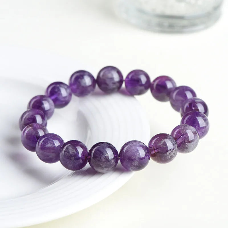 Natural Snow Mountain Purple feather amethyst crystal bracelet with geometric Ruyi pattern.