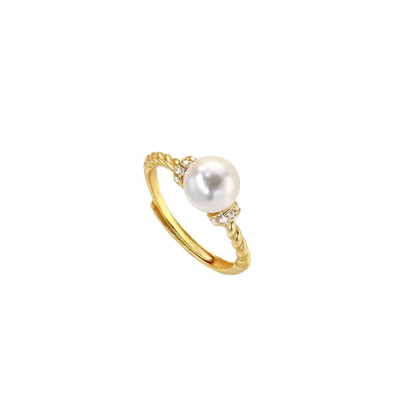 Geometric twist pearl ring with adjustable copper construction in gold colour