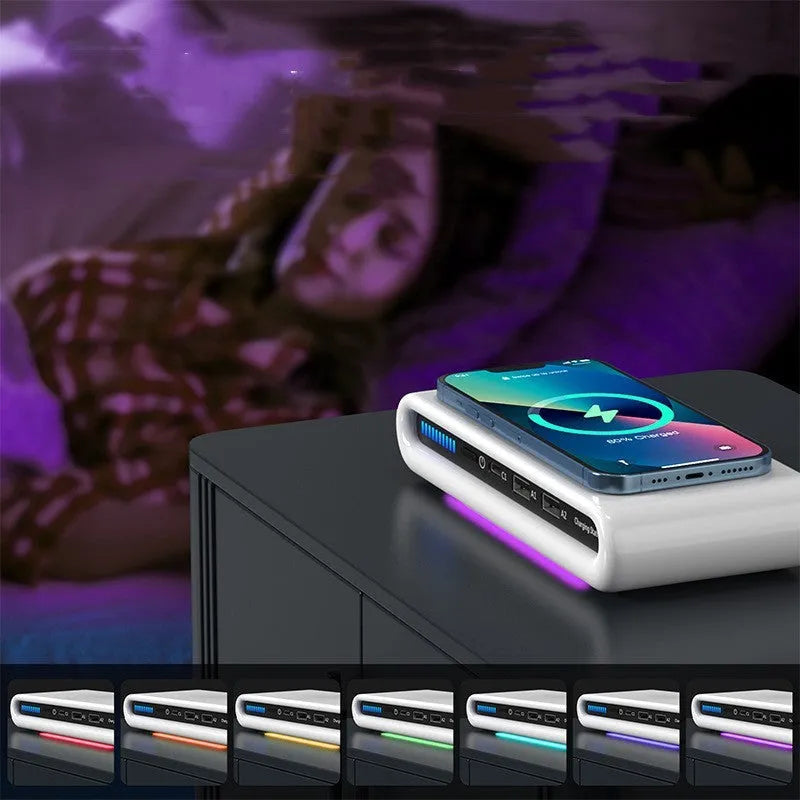 White desktop wireless charger with RGB atmosphere lighting showing phone charging on pad