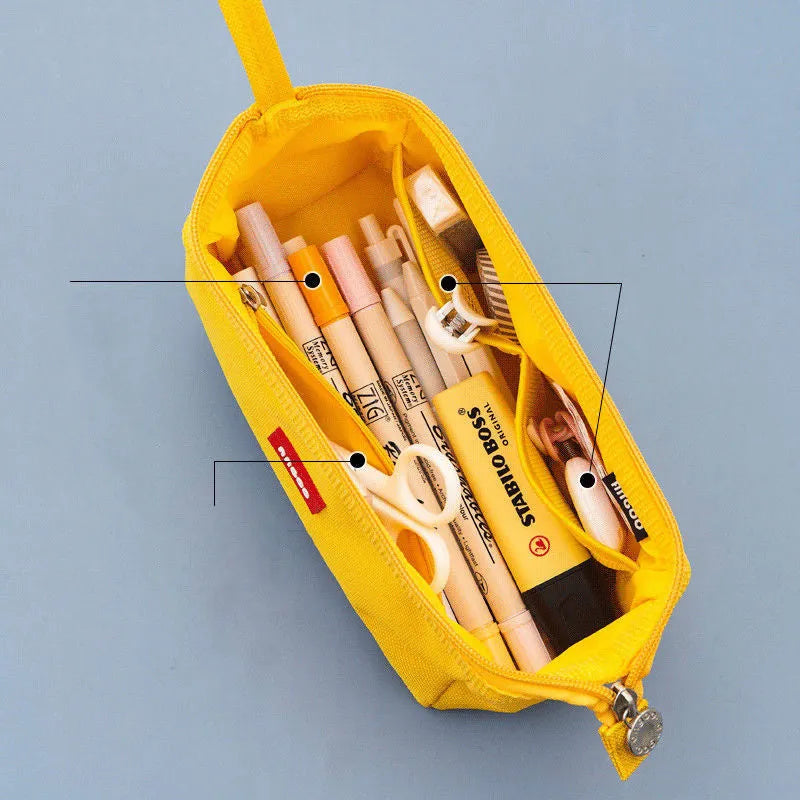 Large-capacity Oxford cloth pencil case with double zipper in yellow, with interior storage visible