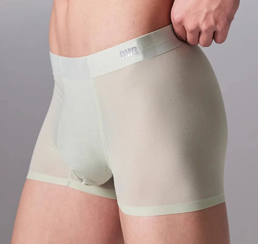 Men's seamless fitness shorts in black, shown flat, highlighting the lightweight fabric and lack of seams.