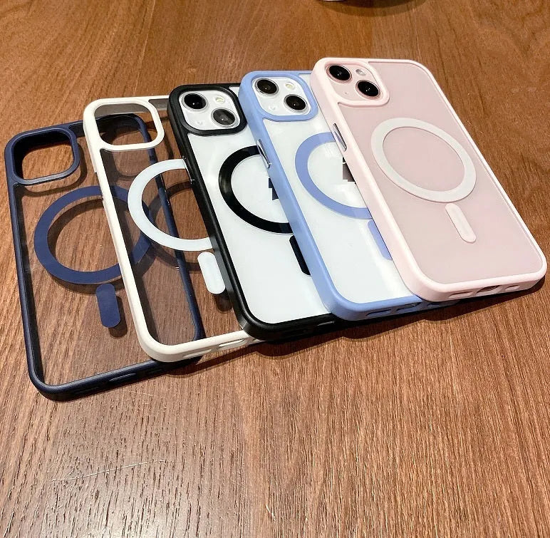 Transparent acrylic MagSafe phone case for iPhone on a table, showing magnetic ring and colour options.