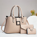 Women's textured crossbody bag set showing woven details and internal organisation compartments