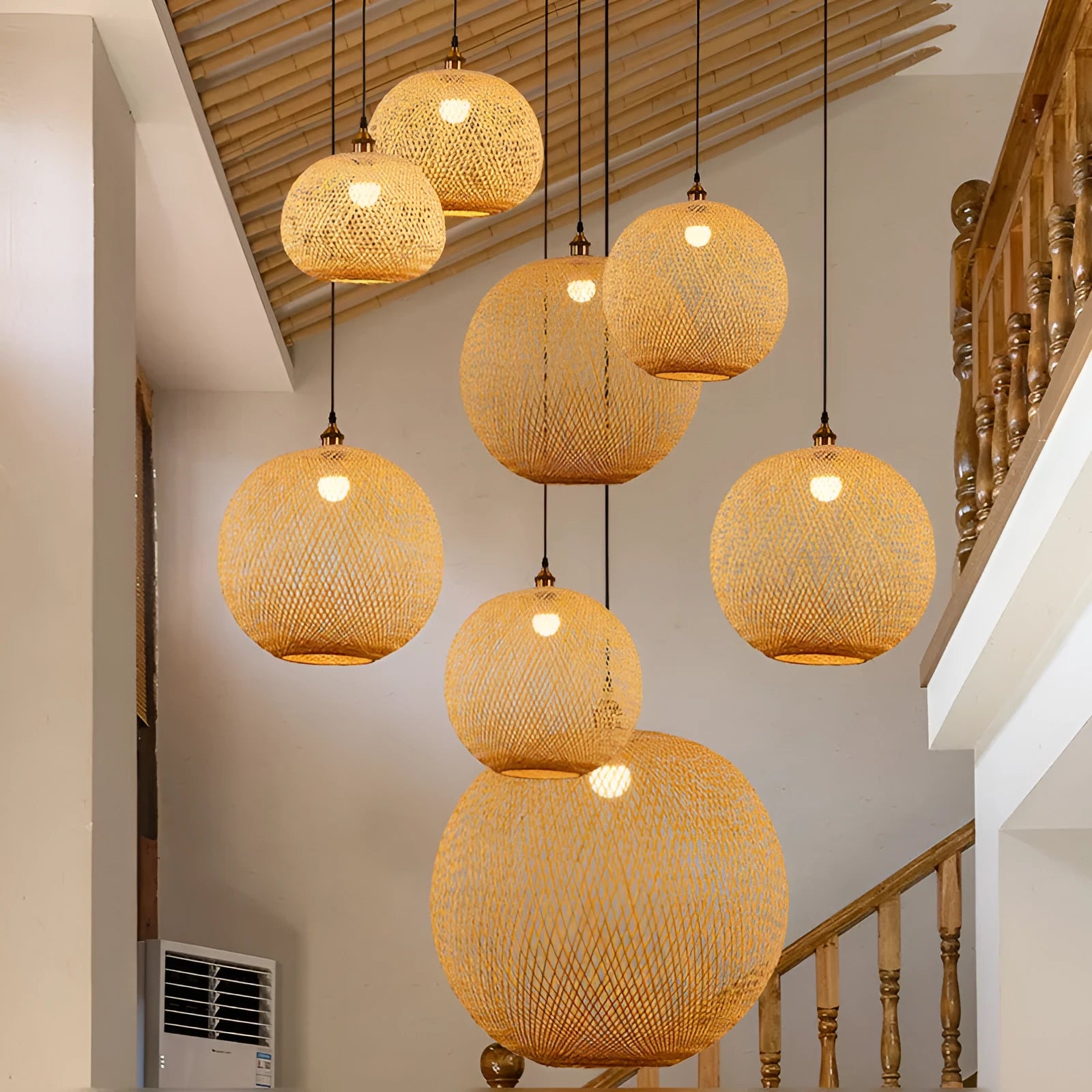 Zen-style pastoral ceiling chandelier with a woven natural rattan lampshade.