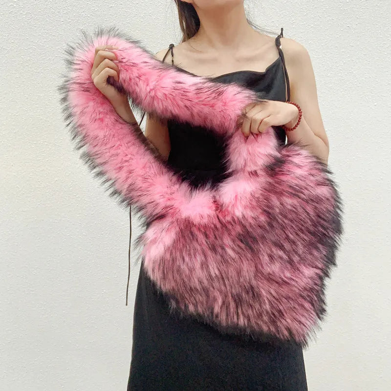 Women's heart-shaped plush crossbody bag in black with tassel and large capacity