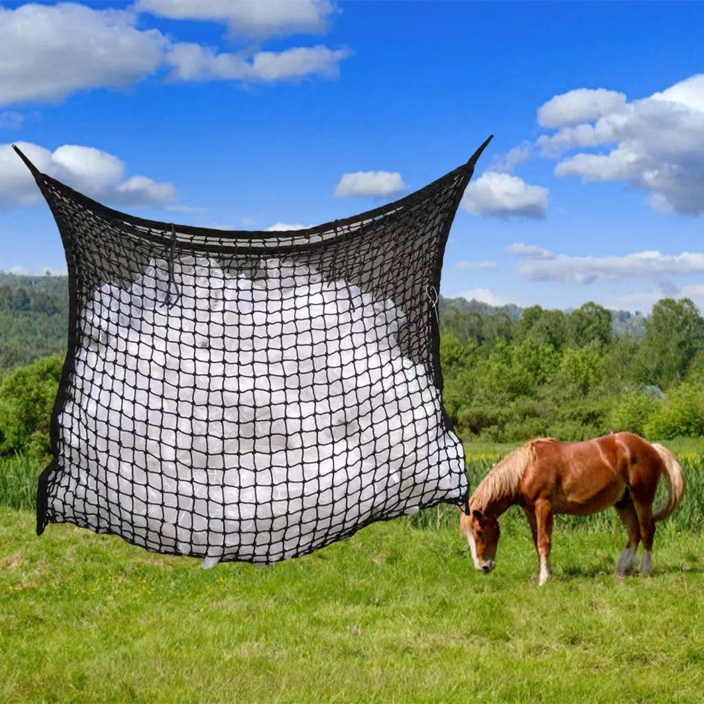 Black woven polyethylene rope hanging hay net for horses, showing the open grid pattern.